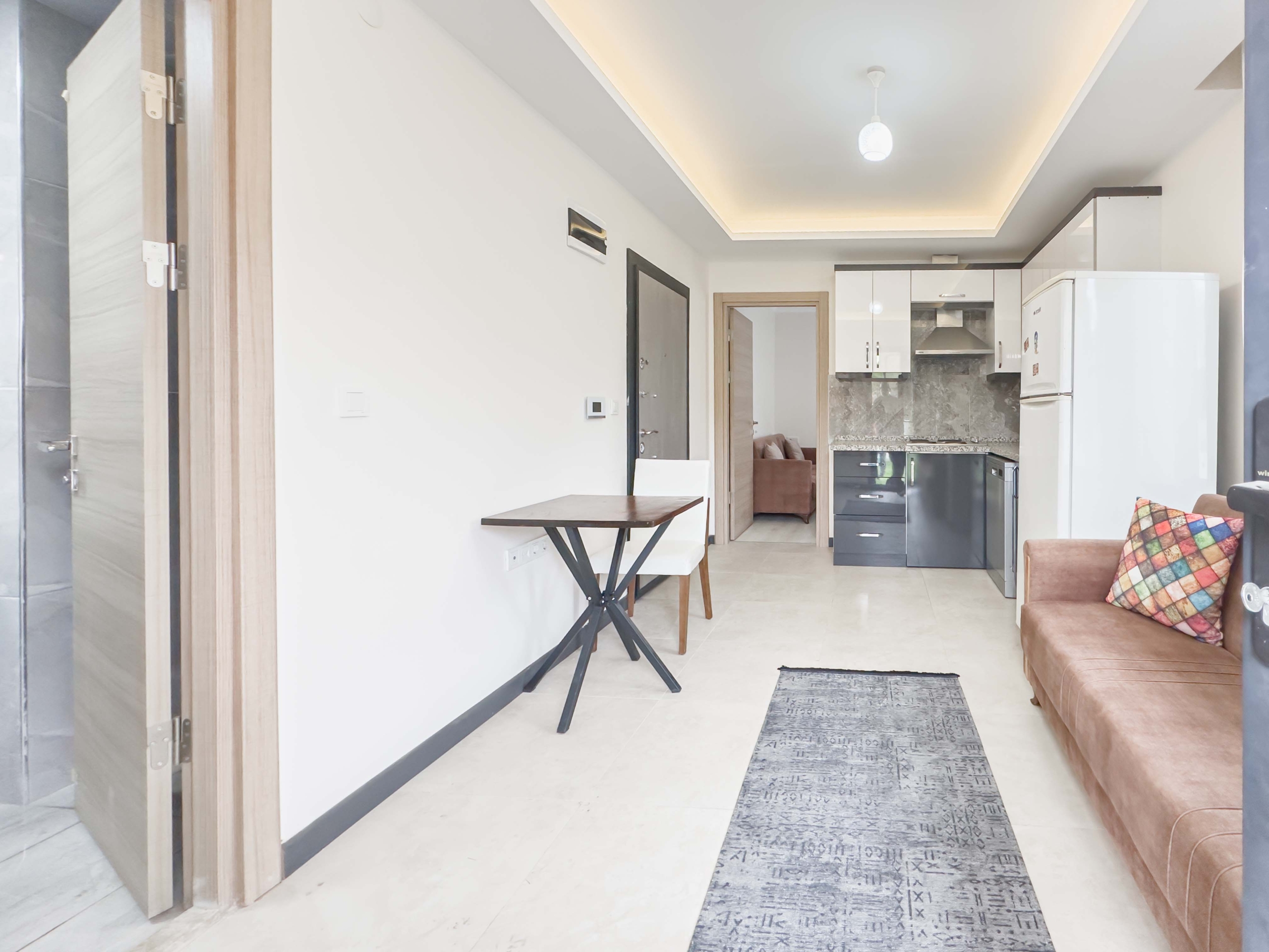 IMG_9640 Gökova | Pazar Yerine Yakın | 1 Yaşında | Eşyalı 1+1 Bahçe Katı
